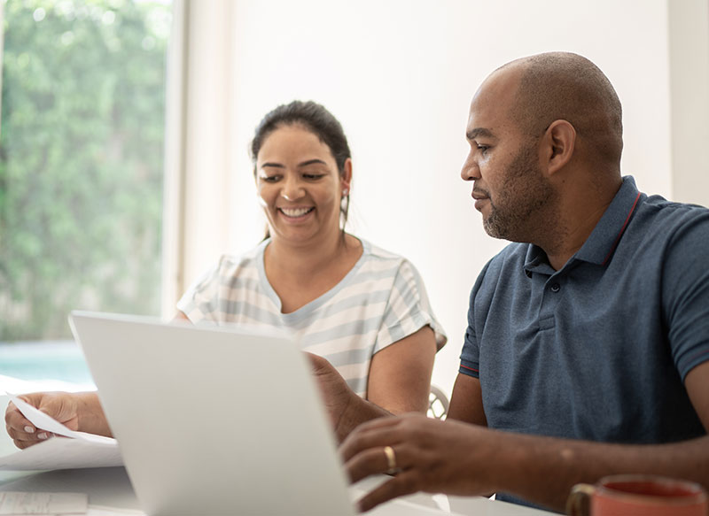 couple checking documents couple checking documents
